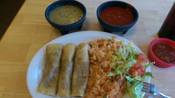 Beef Enchilada plate with sauces on the side