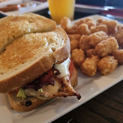 Chicken avocado club with tots