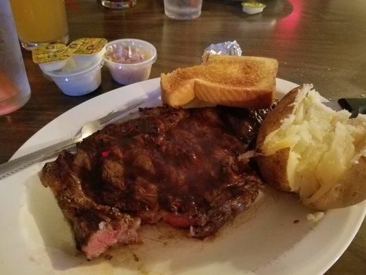 Yummy steak and baked potato, cooked perfectly to order.