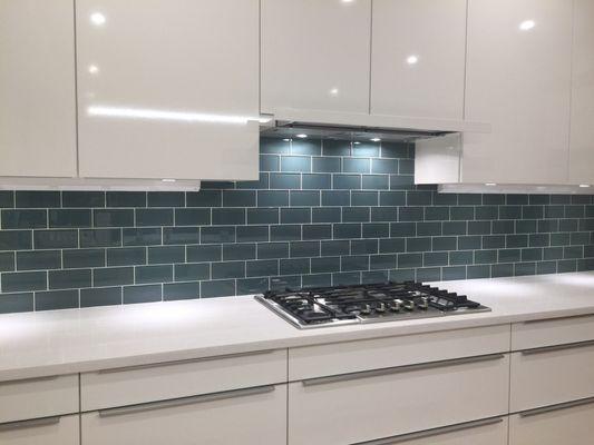 Glass subway tile backsplash