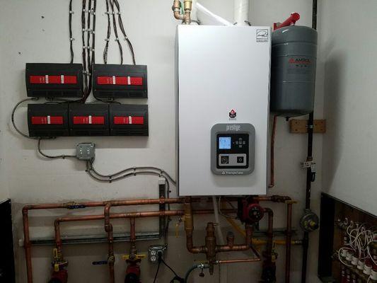 A Triangle tube prestige Boiler installed in a downtown commercial building, 20 zones (thermostats)