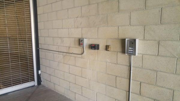 Buzzer on right wall to gain access to free parking