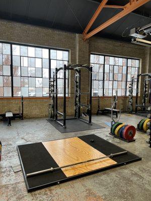 Lifting platforms and squat racks