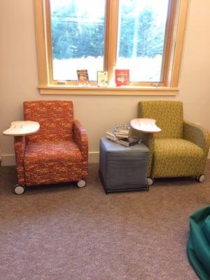 Sitting area with three bean bags on the floor to the right (not pictured).