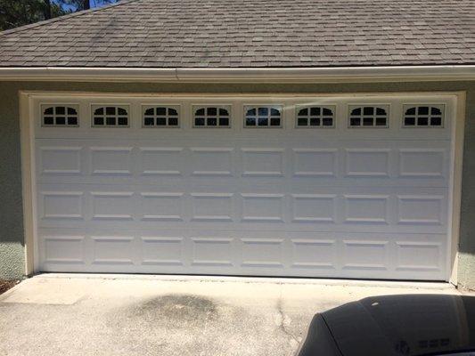 Brand new garage door in Daytona Beach, Florida, installed by American Overhead Door Service.