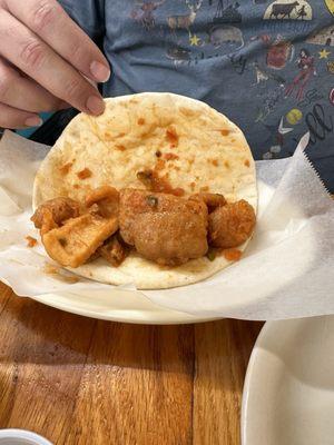 Their spicy Chicharrón taco