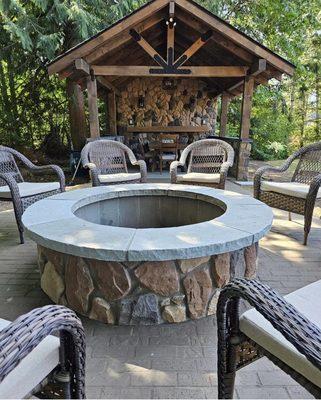 Build in fireplace and covered patio with grouted stone