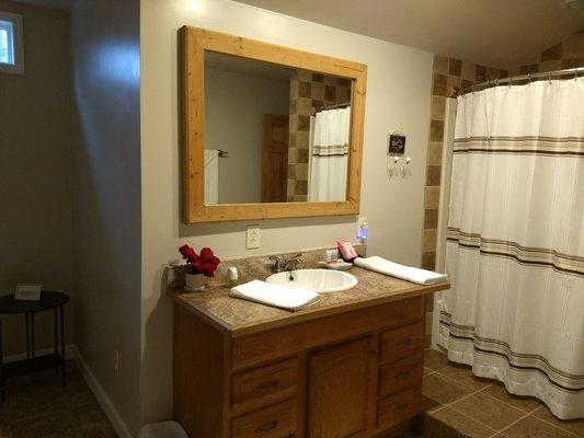 "Ana Suite" private bath and shower.  Plenty of room for your personal belongings.