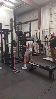 Erik training with Mike (Black Dog Strength). Working on explosive energy with resistance bands.