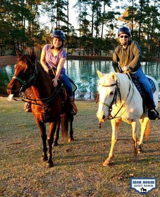 My Wife & I riding about the ranch with Hershey & Gunner. Best time ever!