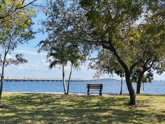 Benches on River w/ Bridge Traffic views