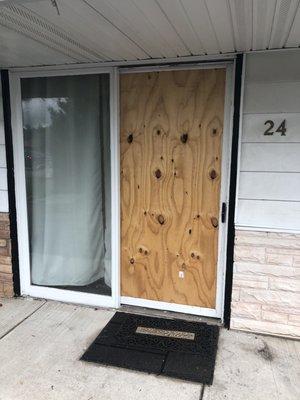 Boarded up window patio