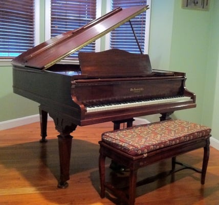 My 1916 Knabe piano, purchased in 1994.  Custom made cushion matches the cover piano cover I removed for this photo.