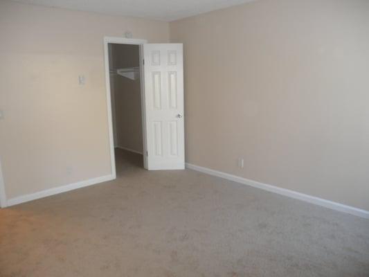 Bedroom looking at walk-in closet