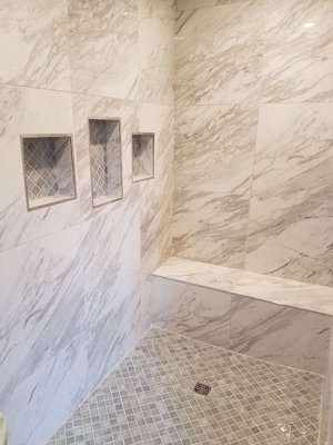 Striking custom tile shower in new Master Bath.