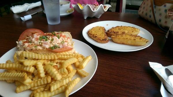 Shrimp po' boy sandwich and cheese toast