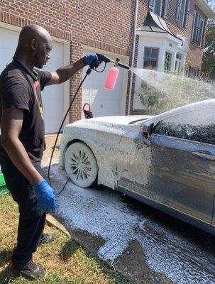 Soap foaming the vehicle down