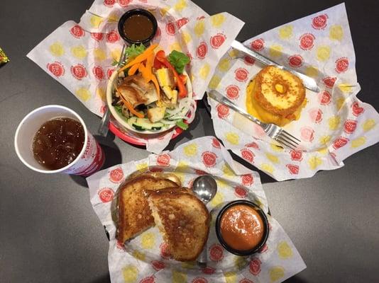 Grilled cheese salad with balsamic, the classic grilled cheese donut, dipper of creamy tomato basil, crunchy garlic chicken.