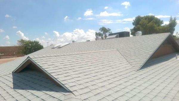 Light gray roof with hips and valleys