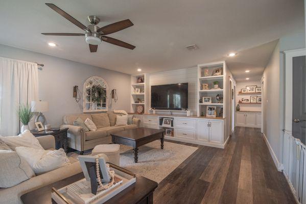 Living Room - Living room featuring built in features, dark hardwood / wood-style flooring, and ceiling fan