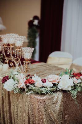 Close-up of our greenery for a bride and groom table