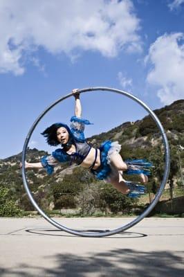 Sarah on Cyr Wheel.  An acrobat, aerialist & dancer currently ready for hire NOW by Eccentric Talent in the LA area.