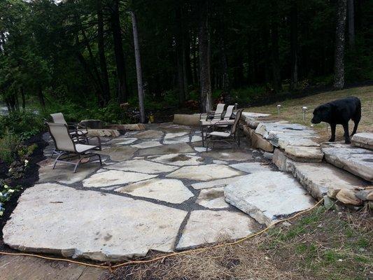 lakeside patio with firepit