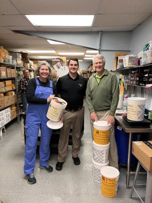 Bill Kenney and John Mathieu deliver sixty pounds of goods to Sharing House, donated by loyal Kilwins Brevard customers!