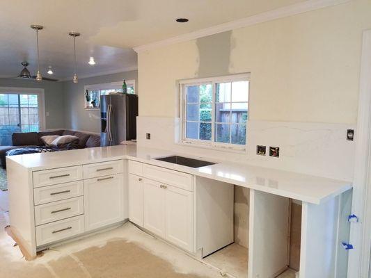 Kitchen counter top full backsplash and waterfall