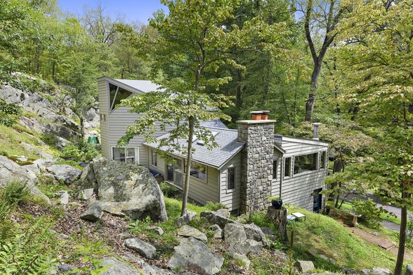 Tyler Road in Putnam Valley. Amazing contemporary nestled into the mountainside.