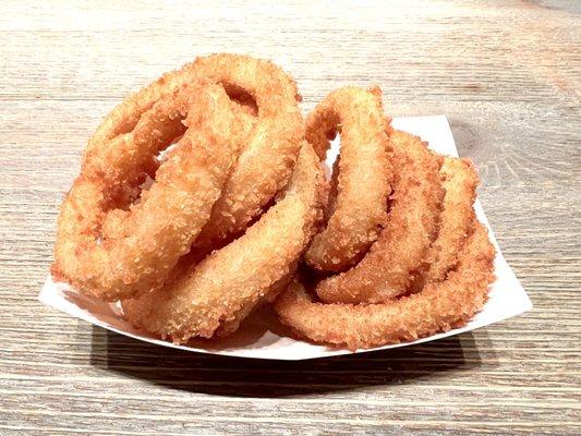 Onion Rings. Golden crispy outside, soft onions inside. The batter isn't thick, which is something I prefer in an onion ring.