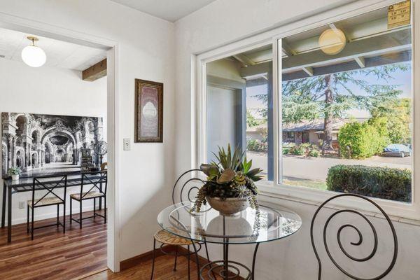 Breakfast nook in petite kitchen.  Perfect size