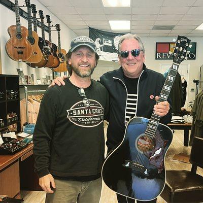 The Local Pickup, Michael, and his Gibson Dove acoustic guitar.