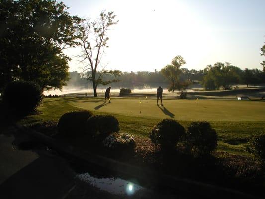 The front putting green on a crisp morning