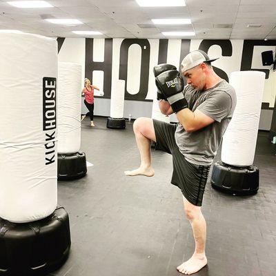 Man kickboxing at KickHouse