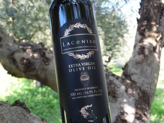 A bottle of our extra virgin olive oil, from Farm to Table.