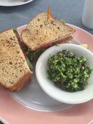 Club sandwich on wheat bread with a side of broccoli salad