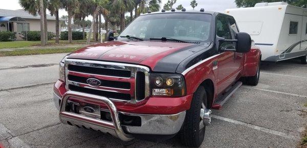 Big Red can pull a house. Dual rear wheels and a diesel motor.