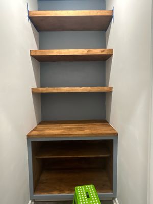 Floating shelves and built in cabinet for small pantry!