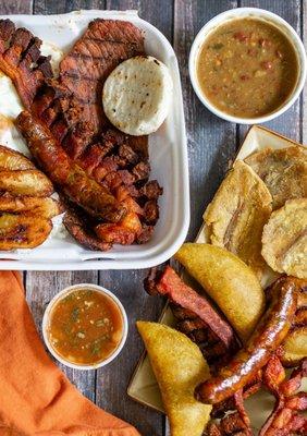 Bandeja Paisa, empanadas, and tostones