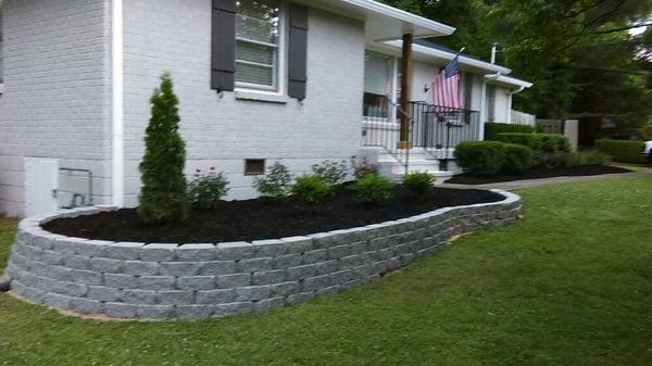 Wall complete with plants and mulch