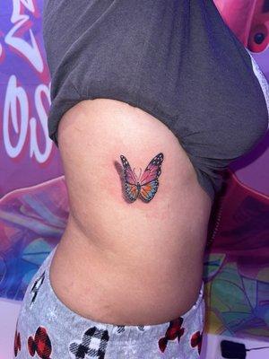 Butterfly cover-up tattoo