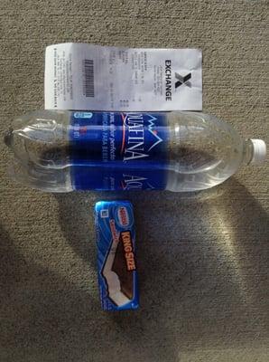 Aquafina 1.5-liter bottle of water ($1.69) and an ice cream sandwich ($1.29)