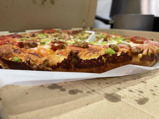 Chicago Style Cheese Pizza with sausage pepperoni and green peppers. Really good!