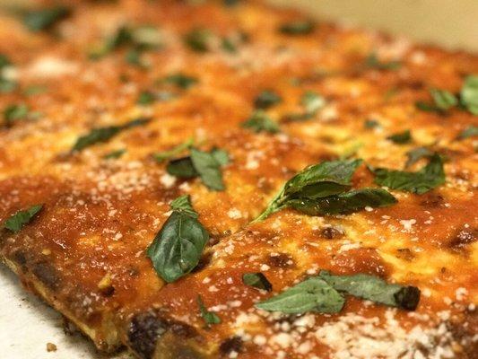 Grandma pie, sauce over cheese, basil optional