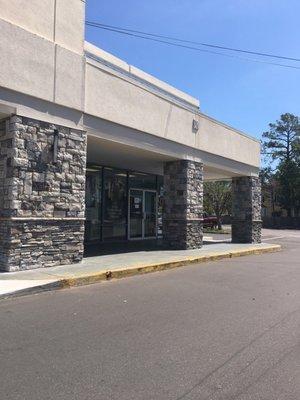 This is store front sans Mr. Dryclean sign (building is in process of getting new coat of paint)