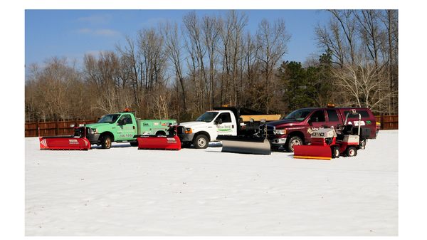 Snowplows stand at the ready in winter