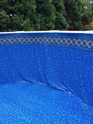 This side of the pool has a big sag and the other side is stretched. Watch the video http://youtu.be/3dwqhLESD_0