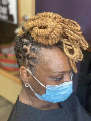 Loc retwist and updo.