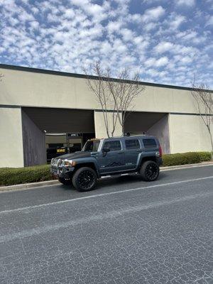 H3 in for a Matte Black Hood Wrap & Ceramic Window Tint